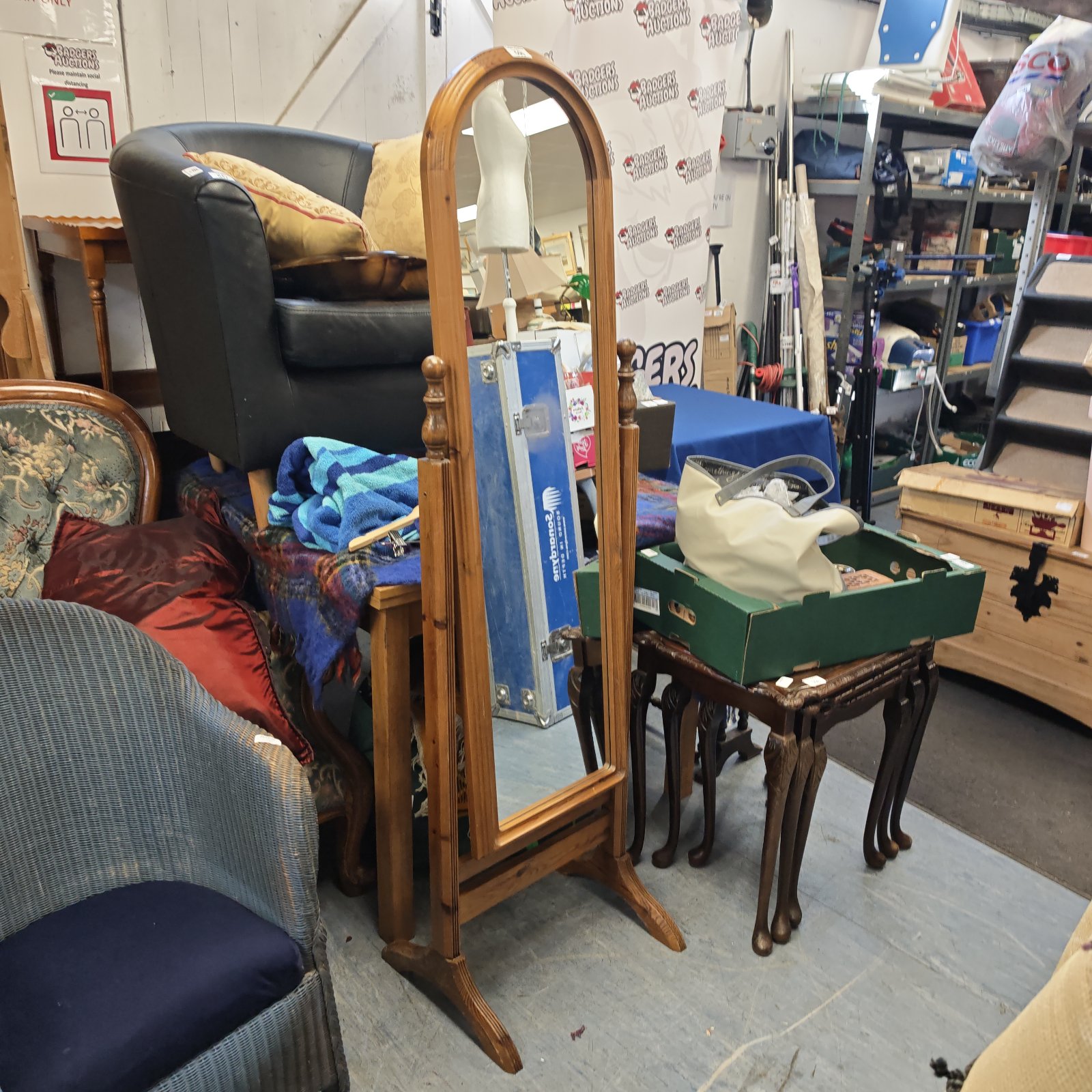 Antique pine dressing mirror with turned supports and rectangular mirror plate.