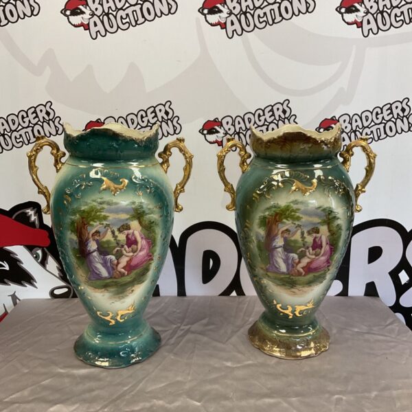 Pair of antique porcelain urn vases with classical scenes.