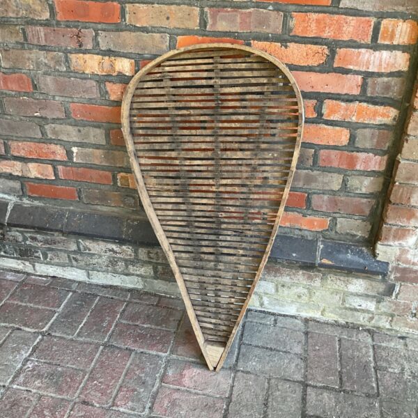 Antique prune tray with wooden slats for drying fruit.
