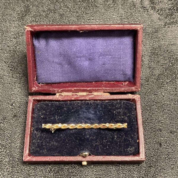 Antique Victorian rose cut stone brooch in original leather box.
