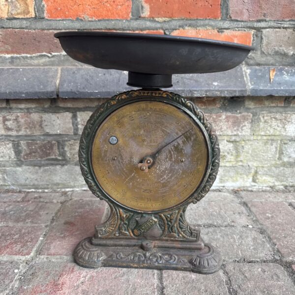 Antique Salter No. 5 scales with brass face and cast iron base.