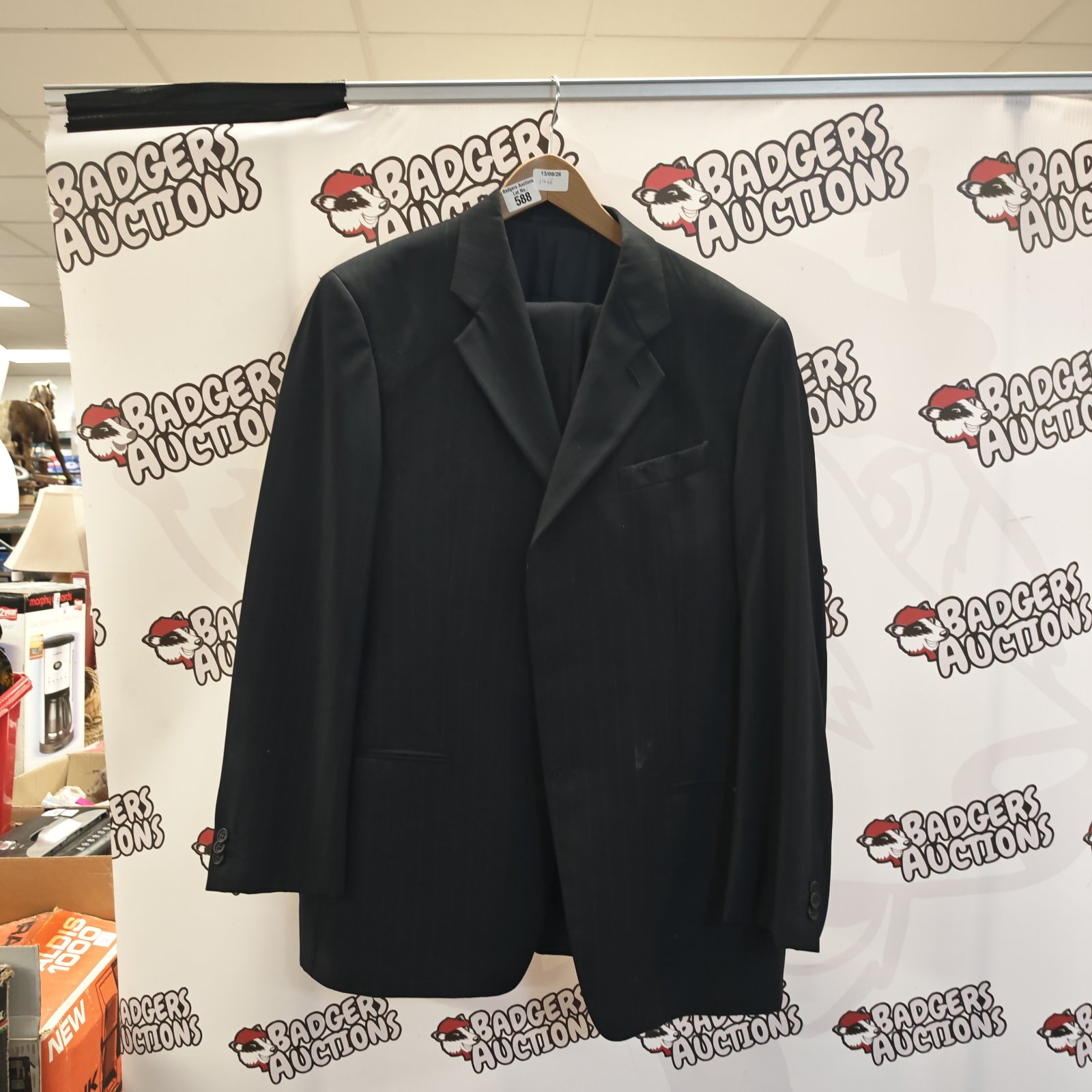 Navy blue Armani Collezioni pin stripe suit jacket and trousers.