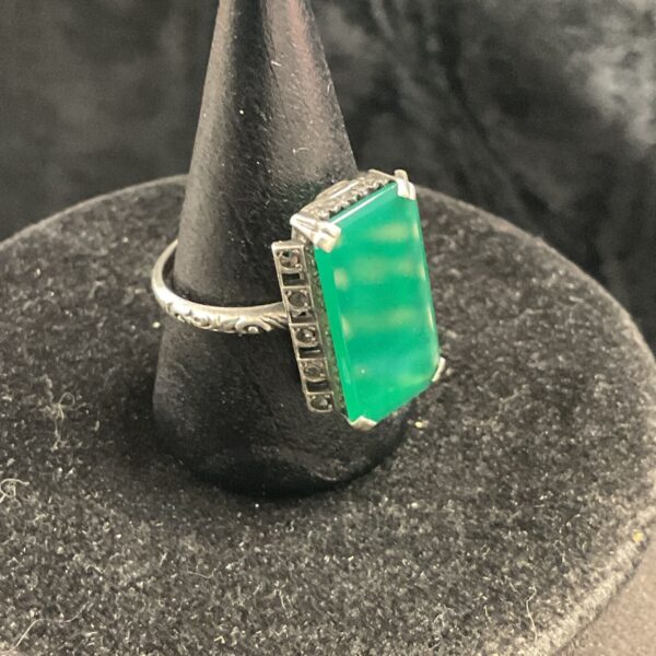 Art Deco ring with green onyx and marcasite detailing.