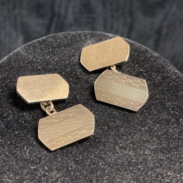 Antique Art Deco Sparta cufflinks with engraved detail.