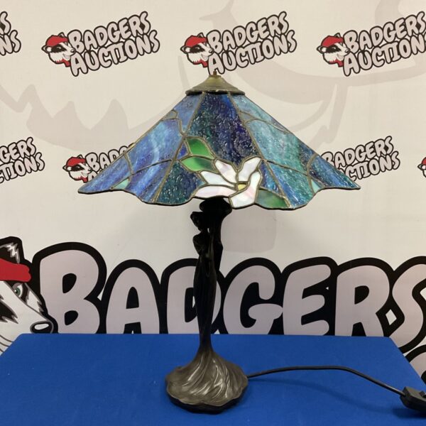 Art Deco table lamp with stained glass lily shade.