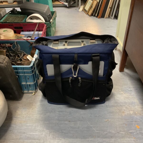 Blue Artbin craft bag with multiple pockets for art supplies.