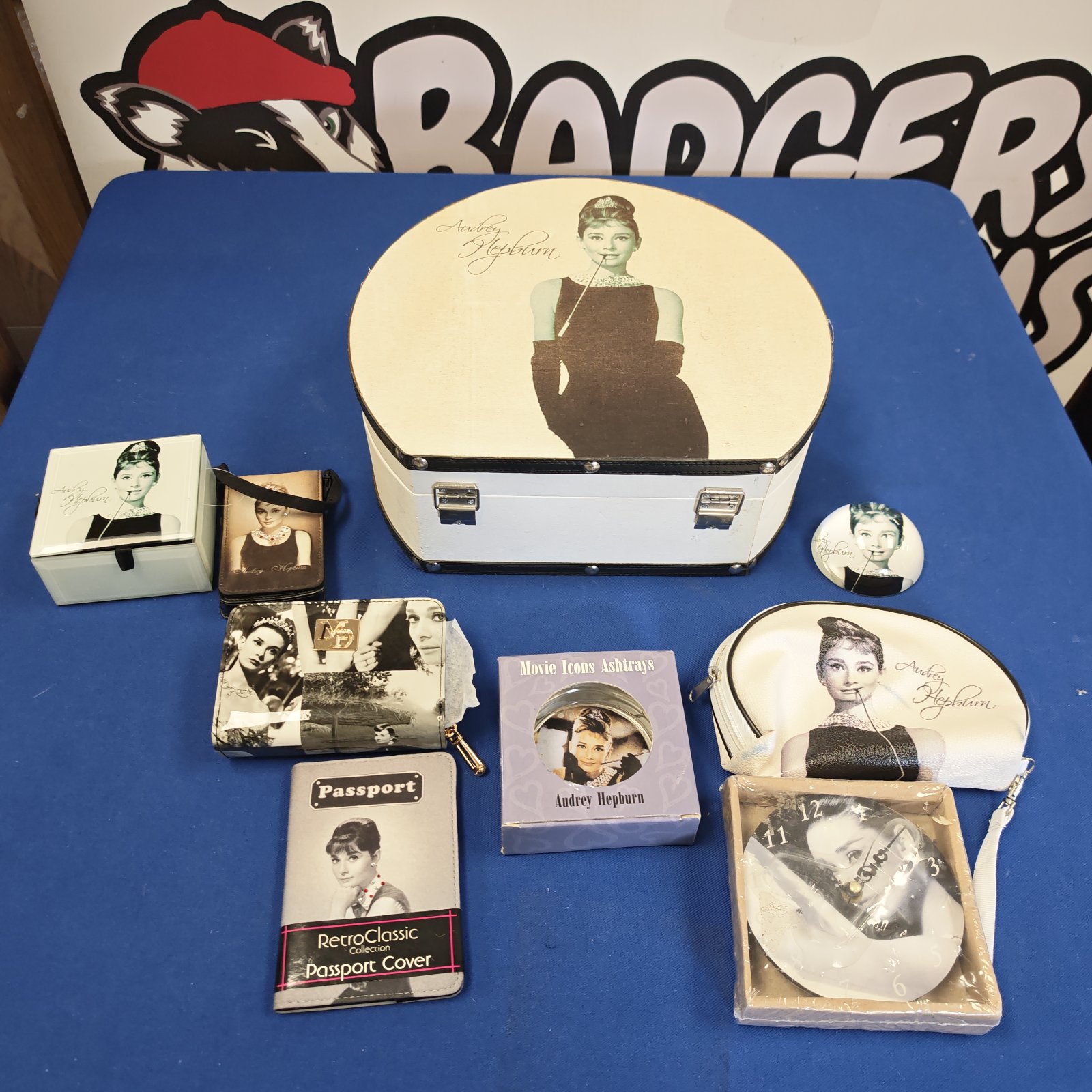 Vintage Audrey Hepburn memorabilia inside a display case.