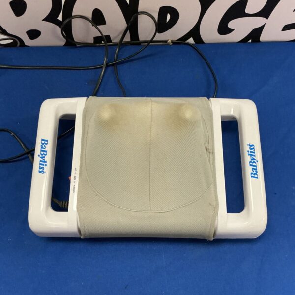 Vintage BaByliss handheld massager for body relaxation.