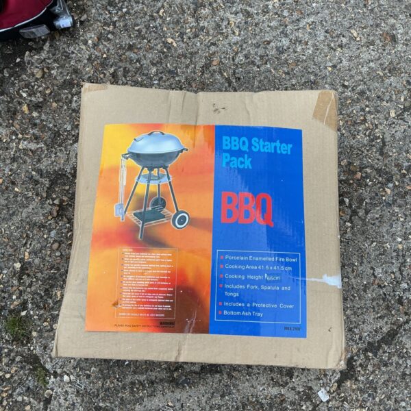 Vintage BBQ Starter Pack with enamel grill and cooking utensils.