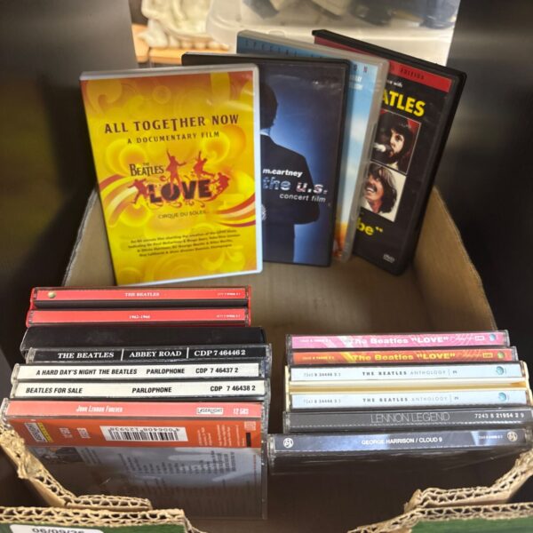 Beatles CDs and DVDs collection for sale.