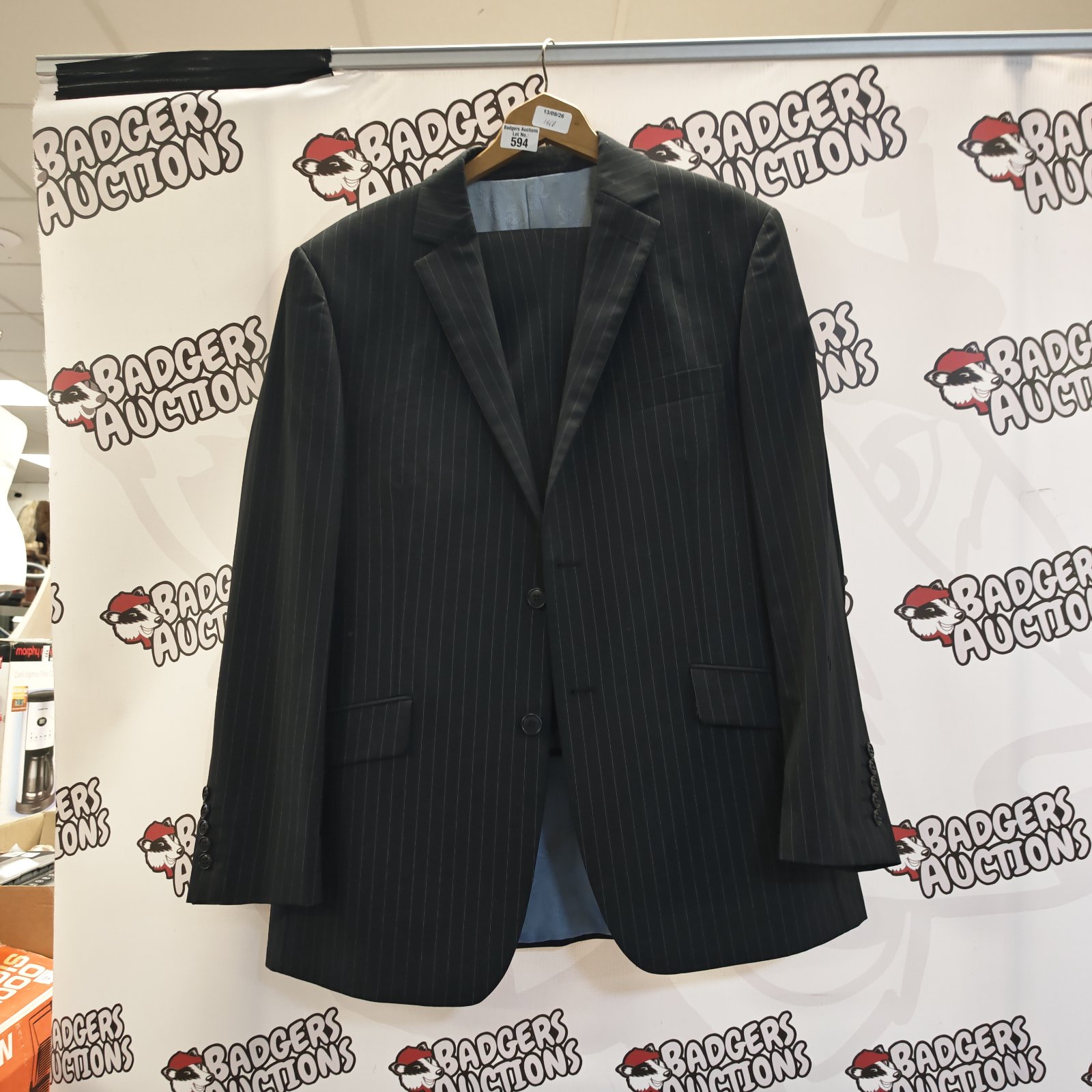Black pin stripe Becwin London suit size 36 for auction.