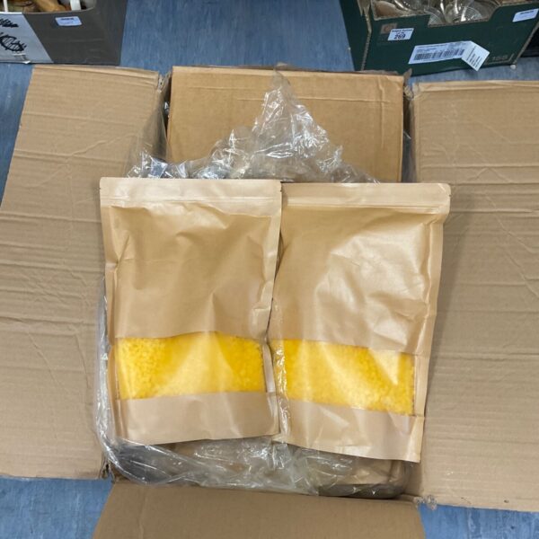 16kg of yellow beeswax blocks ready for crafting.
