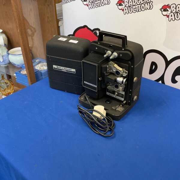 Vintage Bell & Howell Auto Load 8mm film projector in good condition.