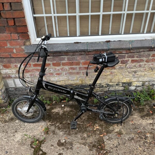 Used Bicycles4U electric folding bike with charger.