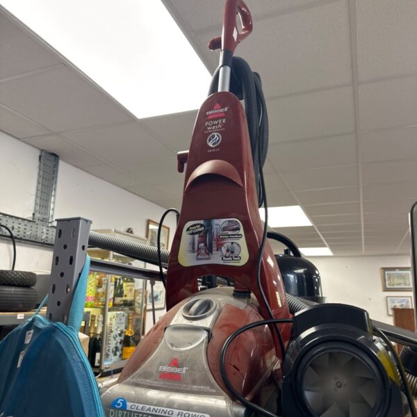Bissell PowerWash carpet cleaner machine for home floor cleaning.