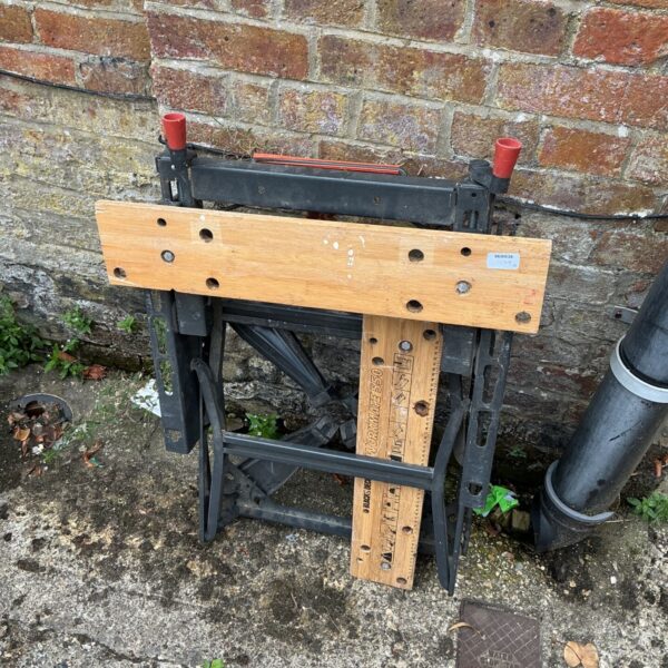 Black and Decker Workmate 550 bench in a garden setting.