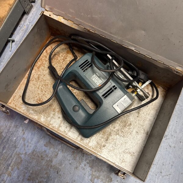 Vintage Black & Decker KS531 jigsaw in its metal carrying case.