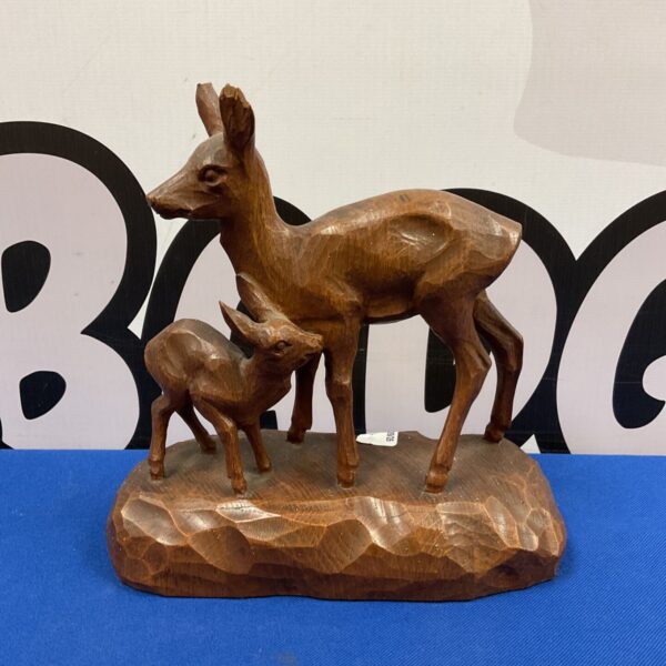 Vintage Black Forest carved wooden deer and fawn sculpture.