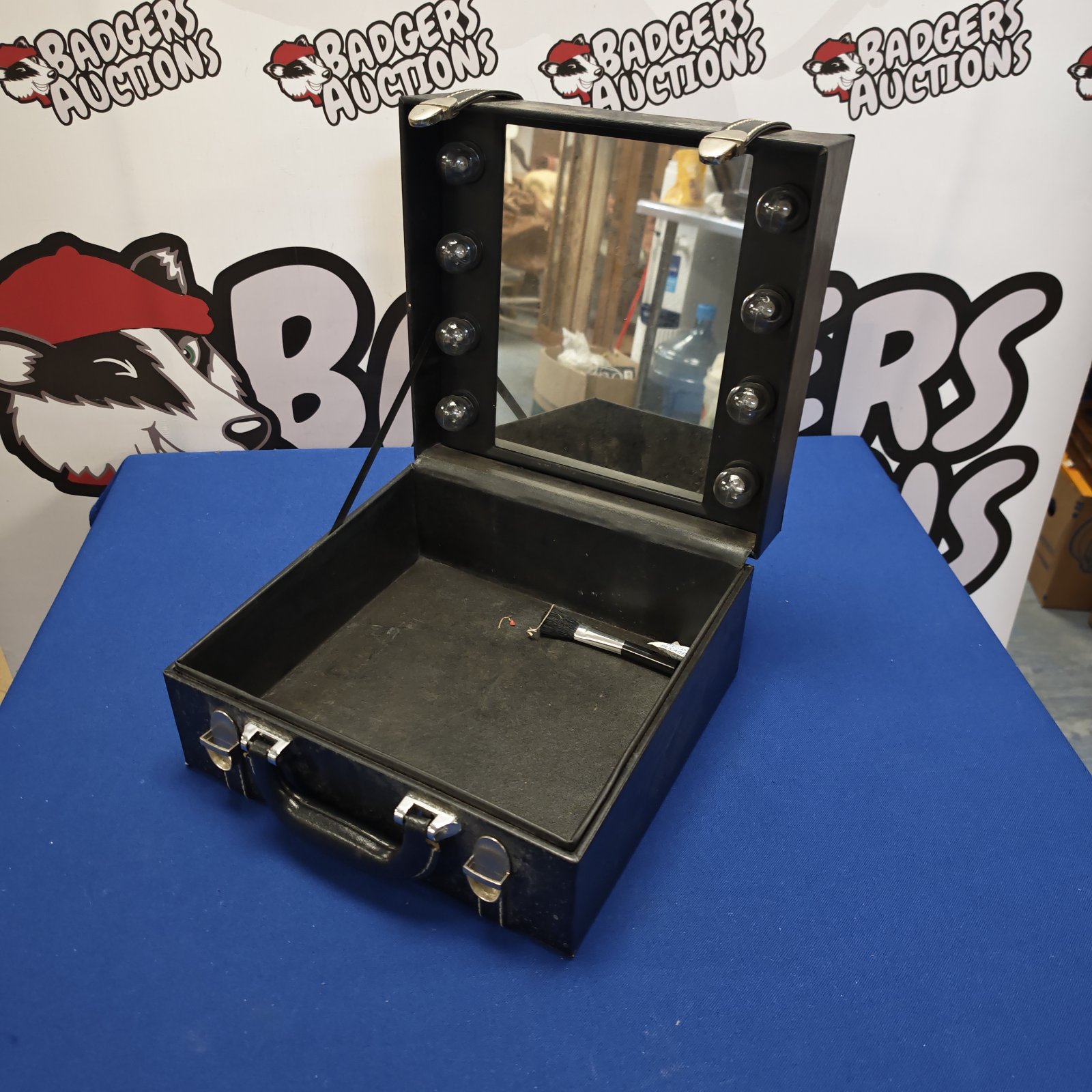 Black leather makeup box with mirror, vintage cosmetic case.
