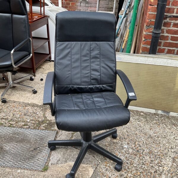 Black office chair with chrome base and adjustable height.