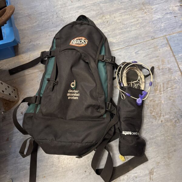 Blacks hiking rucksack with Pacsafe security chain detail.