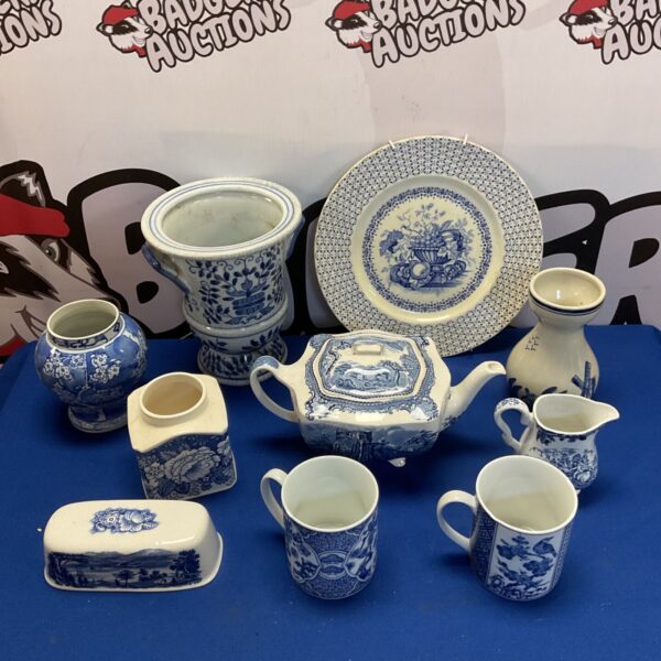 Selection of blue and white china including a teapot and vases.