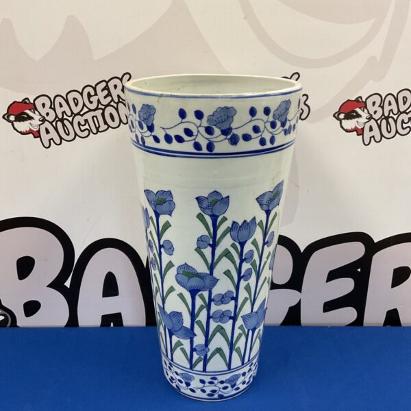 Elegant blue and white porcelain stick stand with lotus flower design.