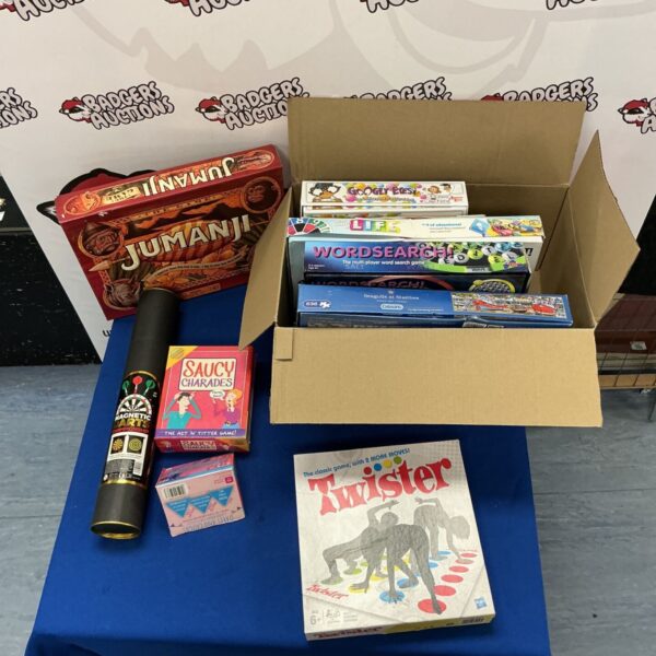 Board game lot featuring Jumanji and other vintage games.