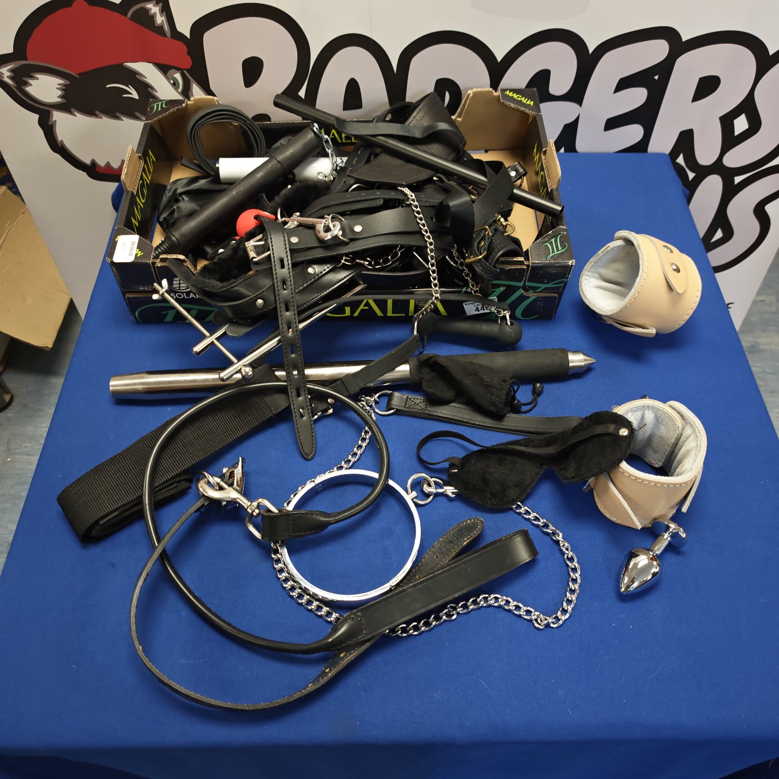 Mixed adult bondage kit with restraints and gag.