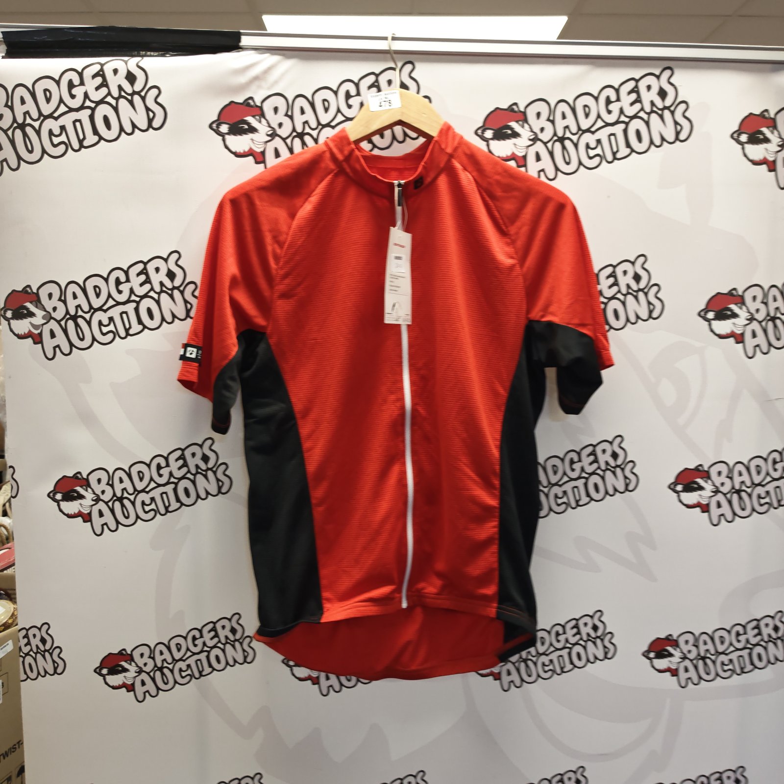 Red Bontrager cycling jersey size medium with tag attached.