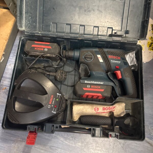 Bosch professional cordless hammer drill in open carrying case.