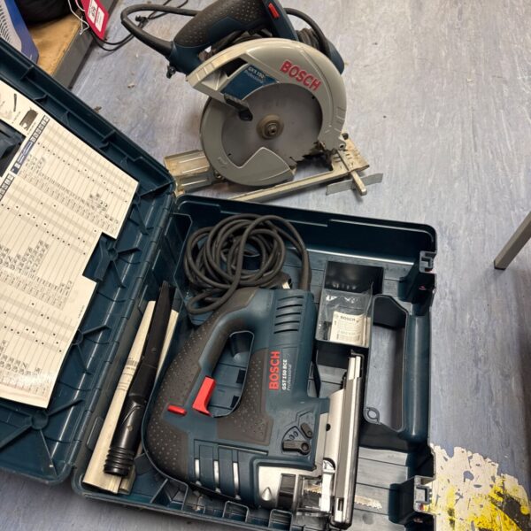 Bosch power tool set with jigsaw and circular saw in carrying case.