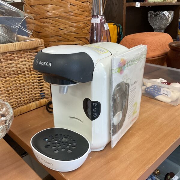 Bosch Tassimo coffee machine model tas12 with instruction booklet.