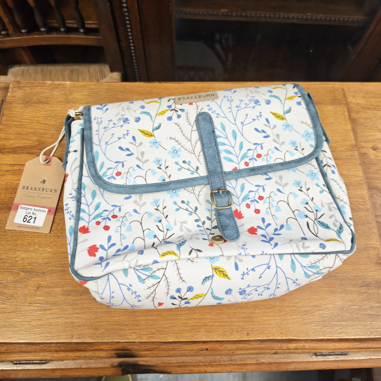 Unused Brake Burn ladies bag with a floral pattern.