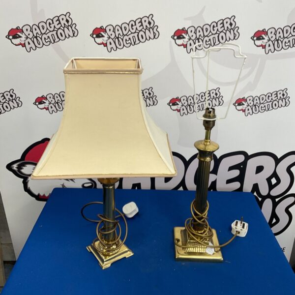 Vintage brass table lamp with cream lampshade, classic home decor.