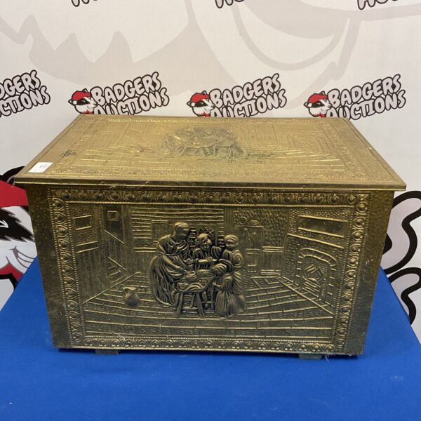Vintage brass coal box with tavern scene detail.