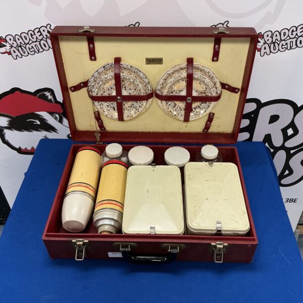 Vintage Brexton picnic case with enamel plates and flasks.
