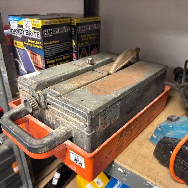 Vintage Briccolina electric tile cutter machine in used condition.