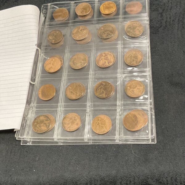 British penny collection in a clear coin album, vintage coins.