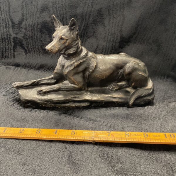 Bronze German Shepherd statue signed L Riche, side view.