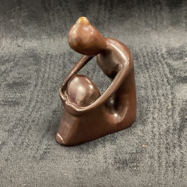 Small bronze sculpture of a seated lady, Art Deco style.