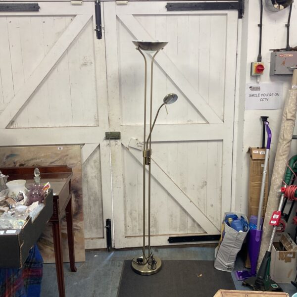 Bronze effect uplighter floor lamp with adjustable head.