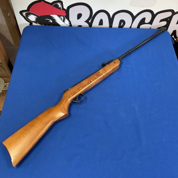 Vintage BSA Meteor .22 air rifle with wooden stock.