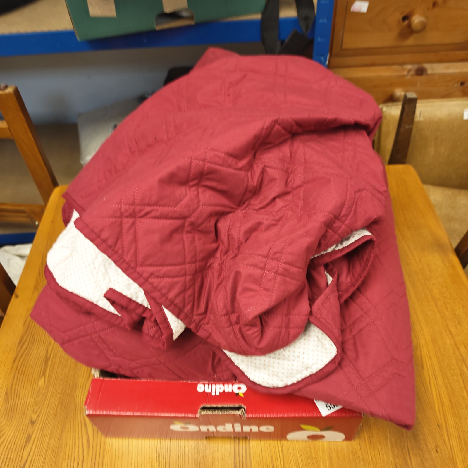 Burgundy patterned sofa covers, a set of four for furniture protection.