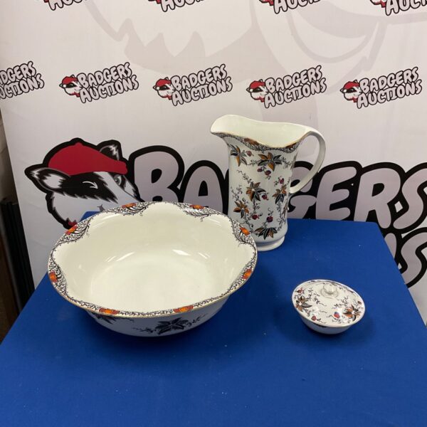 Vintage Burleigh Ware washbowl and jug set with floral design.