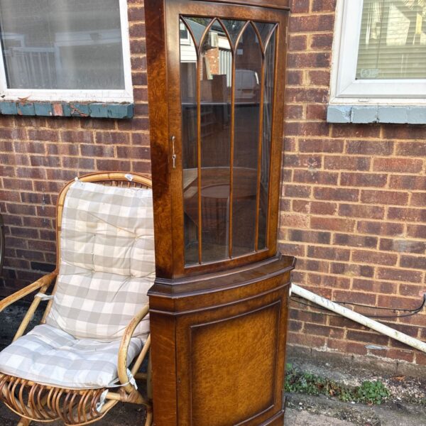 Georgian style burr walnut corner display cabinet in a home setting.