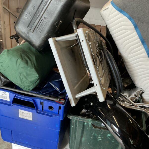 Job lot of camping equipment including a portable stove and containers.