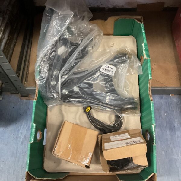 Box of assorted car parts including fog lights and suspension control arm.
