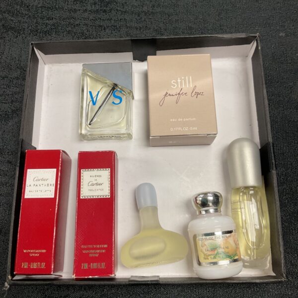 Vintage Cartier and Jennifer Lopez handbag perfume collection.