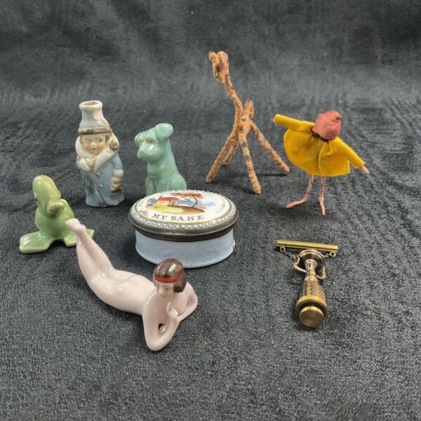Vintage ceramic figures and enamel trinket pot in a mixed lot.